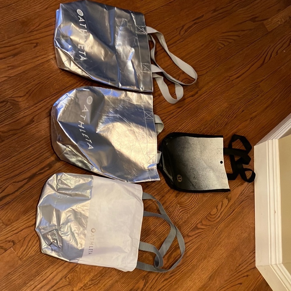 Bundle of 4 reusable bags.  3 Athleta and 1 Lululemon